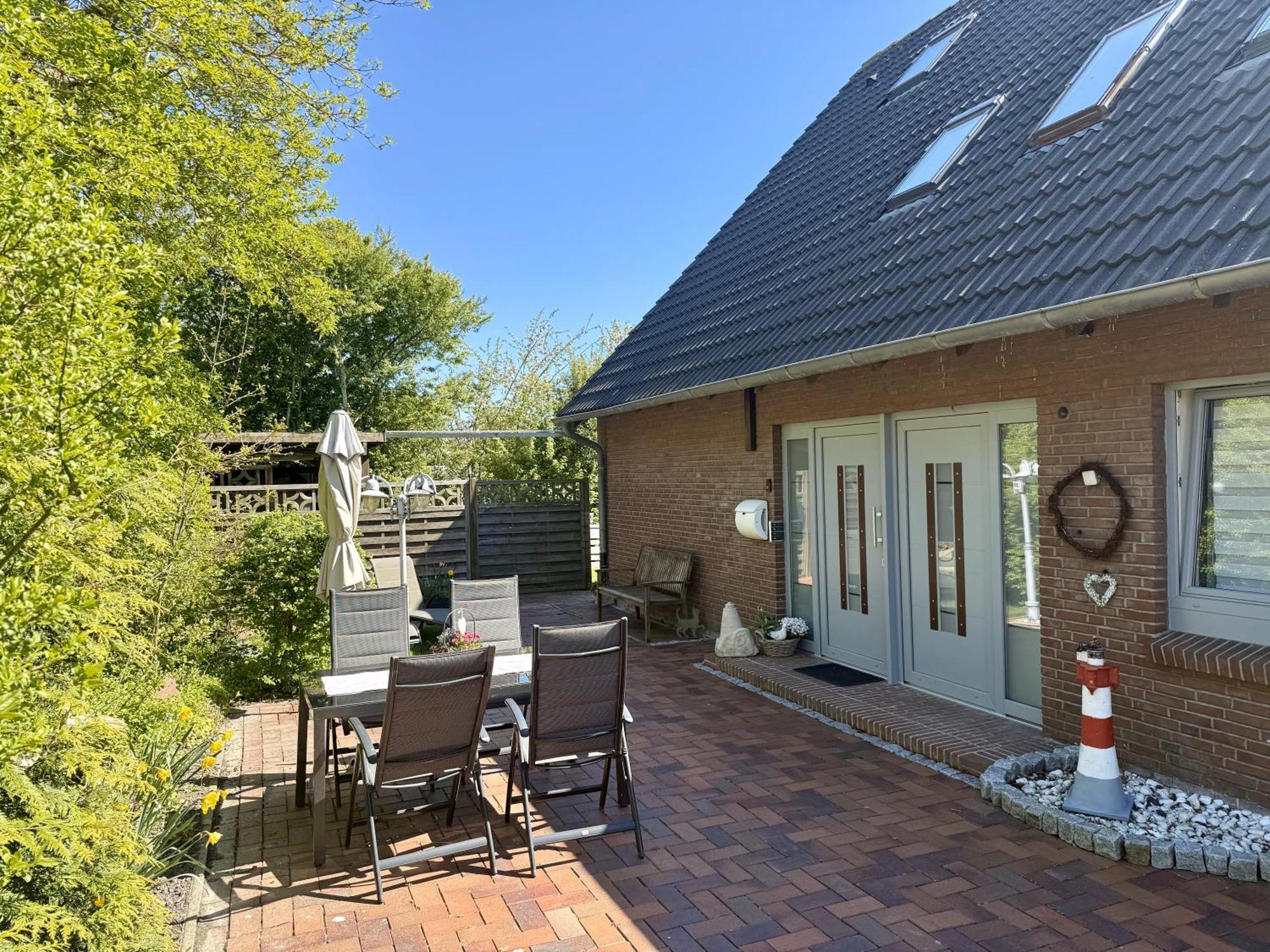 Ferienhaus Blinkfuer Neuharlingersiel Exterior foto