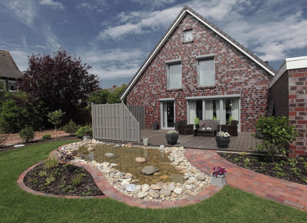 Ferienhaus Blinkfuer Neuharlingersiel Exterior foto